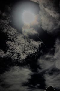 Plane flying close to the sun